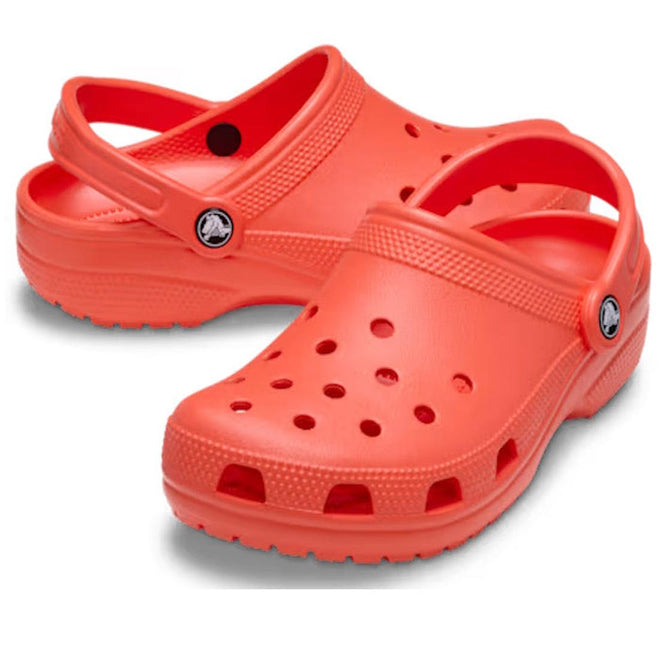 Ap air of adults Crocs Classic bright orange clogs called star fish on a white background