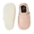 A pair of Bobux XP Explorer Ripple First Walker shoes in Cameo Rose (502603) with a white, flexible sole, one shoe shown from the top and the other displaying the sole. These toddler shoes feature a Velcro strap and a soft, rounded design ideal for first walkers., 42846, 9420068568518, 9420068568525, 9420068568532