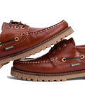 The Barbour Mens Re-Engineered Deck Boat Shoes Tan feature a brown leather upper, sneaker-inspired sole, gold eyelets, black laces, and Barbour branding on the side., 5020985782178, 5020985782659, 5020985783274, 5020985779802, 51888