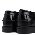Close-up of the heels of Barbour Jen Black Womens Croc Tassel Leather Loafers, highlighting the glossy croc-embossed premium leather and detailed stitching against a white background., 5020985982790, 5020985983353, 5020985983933, 5020985984381, 5020985984824, 51850