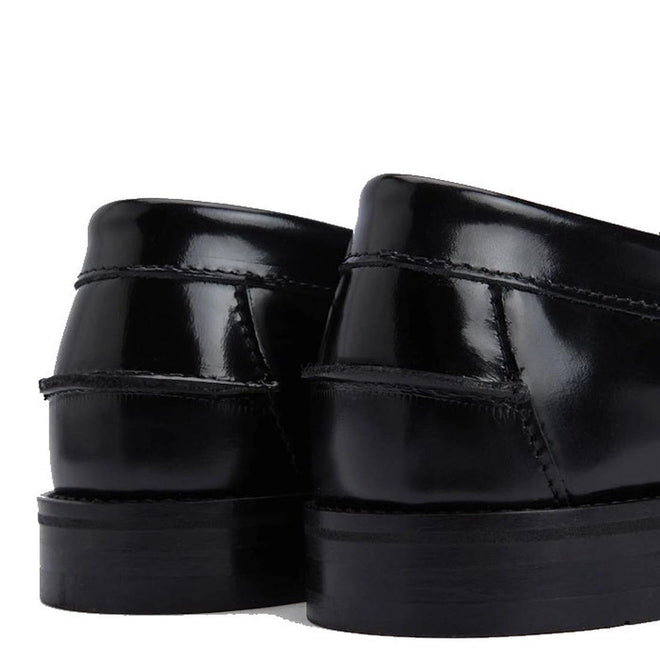 Close-up of the heels of Barbour Jen Black Womens Croc Tassel Leather Loafers, highlighting the glossy croc-embossed premium leather and detailed stitching against a white background., 5020985982790, 5020985983353, 5020985983933, 5020985984381, 5020985984824, 51850