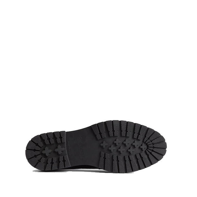 The Barbour Maddie Black Leather Womens Chunky Loafer is shown with a black sole featuring deep, rugged treads and patterns for traction against a white background, highlighting its durable craftsmanship., 51897, 5020985778720, 5020985779352, 5020985780068, 51901, 51902