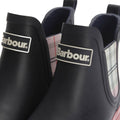 Close-up of two Barbour Mallow Navy Cherry Blossom Chelsea Women's Wellington Rainboots. The boots have black uppers, white logo labels, and plaid side panels in light pink and blue for added style to these weatherproof essentials., 5063669170908, 5063669170915, 5063669170922, 5063669170939, 5063669170946, 5063669170953
