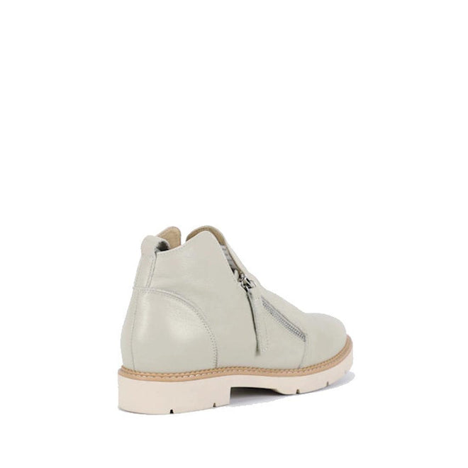 The Bay Lane Clara Ice Light Grey Women's Leather Low Cut Ankle Zip Boot features premium leather, a beige sole, side zipper, and luxe support footbed for all-day comfort. Shown angled to highlight the outer side and back against a white background., 51279, 9357649075632, 9357649075649, 9357649075656, 9357649075663, 9357649075670, 51285