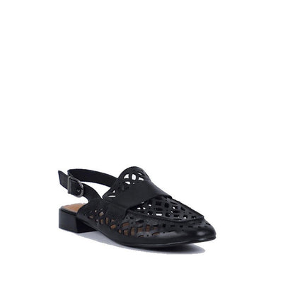 The Bay Lane Prima Black Leather Sling Back Sandal features laser-cut detailing, a flat heel, and a closed pointed toe, shown against a white background.