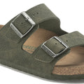 Showing the detail of the birkenstock vegan slide Green sandal with silver buckles on a white background., 4061418353306,
4061418353344,
4061418353382,
4061418353429,
