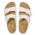 Top down view of Arizona Eggshell White Birkenstock Birko Flor sandals with beige soles on a white background. Showing buckle adjustable double straps.,
4066648369509,
4066648369547,
4066648369585,