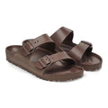The BIRKENSTOCK Arizona EVA Brown Roast REGULAR Width sandals, with two adjustable buckles and textured waterproof soles, are shown angled on a white background., 4066648335047, 4066648335085, 4066648338321, 4066648338369, 4066648338406, 50615