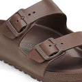Close-up of the BIRKENSTOCK Arizona EVA Brown Roast sandal, REGULAR width, featuring two adjustable buckle straps, a textured footbed, waterproof construction, and the Birkenstock name embossed on the side., 4066648335047, 4066648335085, 4066648338321, 4066648338369, 4066648338406, 50615