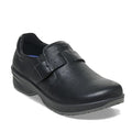 The BIRKENSTOCK Caris Pro Slip Resistant Black Leather Shoe features a wide strap with a rectangular buckle, low heel, and textured rubber sole, offering reliable comfort for formal or professional work settings as occupational footwear.