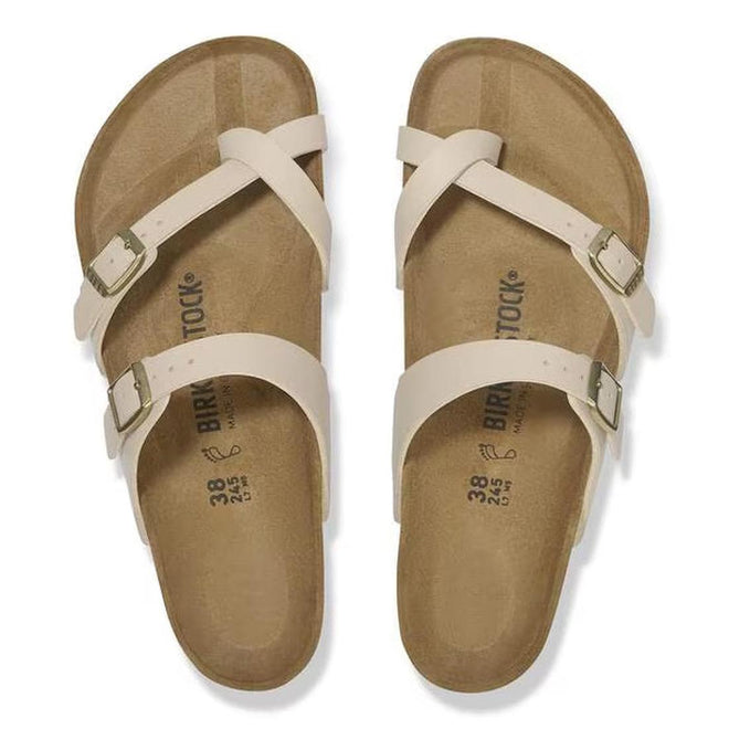 A top down view of Birkenstock mayari sandals slides showing the beige upper ona insole of teh sandal.,
4067707169030,
4067707169078,
4067707169115,
4067707169153,