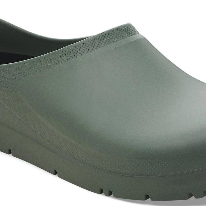 Green rubber clog shoe on a white background.,
4066648850229,
4066648850267,
4066648850304,