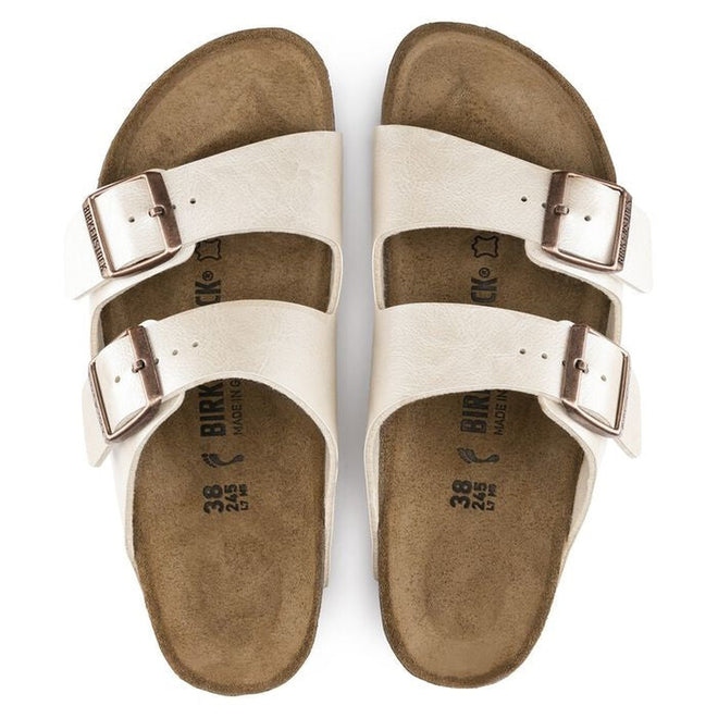 top down view showing the insole of both feet of an Arizona 2 strap sandal in graceful pearl white showing the goldl burnished looking birkenstock buckles adjustable on the 2 straps of both feet.,4044477107172,4044477107196,4044477107219,4044477107233,4044477107257,4044477107271,,,,,,,
