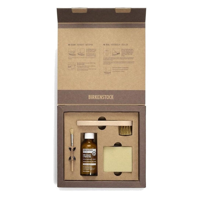 The Birkenstock Footbed Shoe Care Pack Kit comes in an open brown box containing a cleaner bottle, suede brush, sponge, applicator brush, and instructions printed inside the lid.