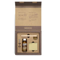 Open box containing a Birkenstock Suede Shoe Care Pack Kit with cleaning brush, cleaner bottle, sponge, wooden handle, and metal tool. Printed instructions are on the inside lid.