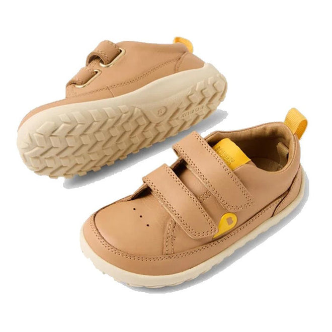 A pair of brown Bobux toddlers leather sneakers with double strap closure and a rubber sole.