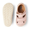 The Bobux IW Iwalk Troop Toddlers Leather Sandal in Cameo Rose Pink is shown from the top and bottom, featuring closed toes, Velcro straps, and flexible white zero drop soles with a textured grip pattern., 46383, 9420068562561, 9420068562578, 9420068562585, 9420068562592