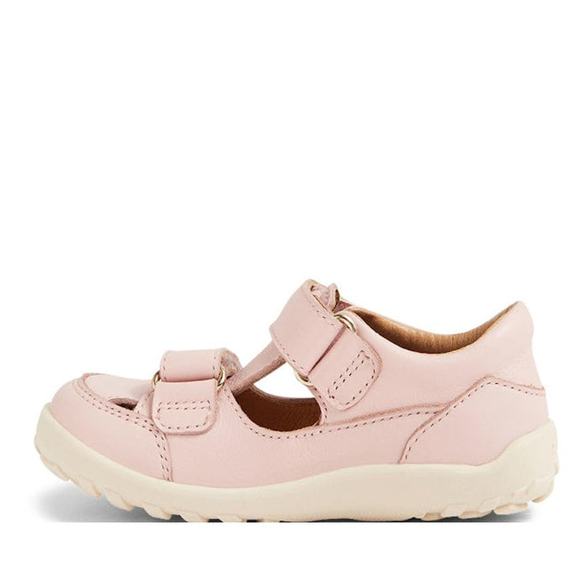 The Bobux IW Iwalk Troop Toddlers Leather Sandal in Cameo Rose Pink features two adjustable Velcro straps, a closed toe, and a sturdy zero drop cream sole—ideal for everyday comfort and active toddlers., 46383, 9420068562561, 9420068562578, 9420068562585, 9420068562592