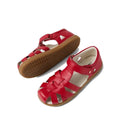 The Bobux Kids Plus KP Tropicana II Salsa Red Closed Toe Leather Sandal features a woven leather design, Velcro strap, brown rubber soles, and water resistance—perfect for kids’ comfort and all-day play. Displayed on a white background., 9420074865311, 9420074865328, 9420074865335, 9420074865342, 9420074865359, 9420074865366, 9420074865373