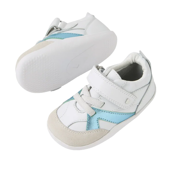The Bobux Xplorer XP Chase White Blue Jelly Mint First Walker Crawler shoes are displayed on a white background, featuring two white baby sneakers with light blue accents, beige toe detail, Velcro straps, and white rubber soles—perfect as pre walker shoes for your little one., 9420074870285, 9420074870292, 9420074870308