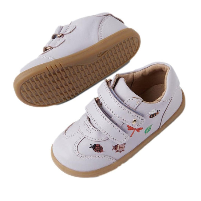 The Bobux Iwalk Buggie Thistle Lavender Embroidered Trainer is a pair of toddler shoes made from Quickdry leather in light purple, with tan rubber soles, insect and animal embroidery, and two velcro straps for fastening., 9420074829337, 9420074829344, 9420074829351, 9420074829368, 9420074829375