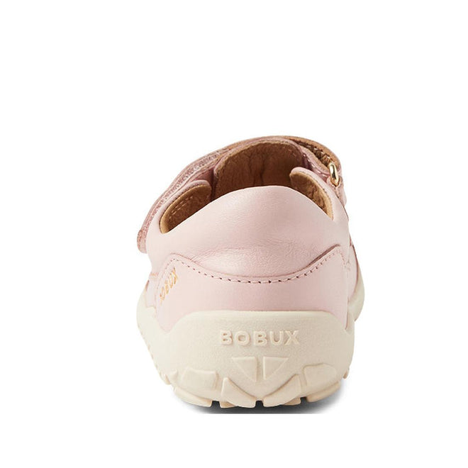 A close-up rear view of the Bobux Kid+ Troop Leather Closed Toe Sandal in Cameo Rose Pink with a cream sole. BOBUX is embossed on the heel, and its wide toe box offers comfort. Set against a plain white background., 9420068562882, 9420068562899, 9420068562905, 9420068562912, 46321, 46322, 46323