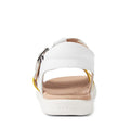 A rear view of the Bobux Kids + Plus Girls Haven White Pale Banana sandal, featuring a white leather upper, adjustable silver-buckle strap, cushioned beige insole, and BOBUX embossed on the white rubber sole—ideal summer shoes for kids., 46617, 46618, 46619, 46620, 46621, 46622, 46623
