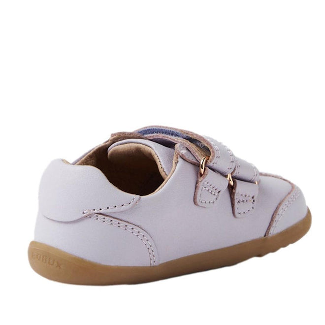 The Bobux Step Up Buggie Embroidered Sneaker in Thistle Purple is a light purple leather toddler shoe with a tan rubber sole, two hook-and-loop straps, and visible stitching—perfect for first walkers., 9420074828507, 9420074828514, 9420074828521