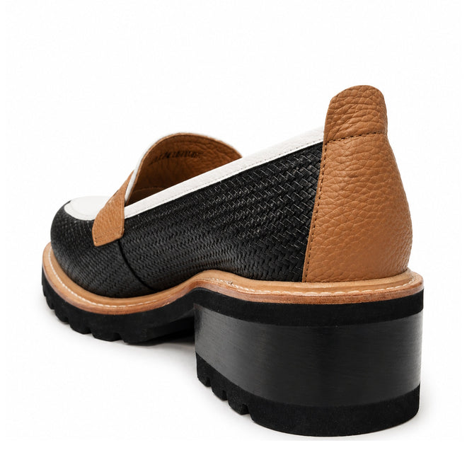 The Bresley Delmira Black Combo Leather Loafer features a black woven upper, chunky black heel, tan leather accents on the back and trim, and a thick sole, shown from a back side angle against a white background., 51680, 51681, 51682, 51683, 51684