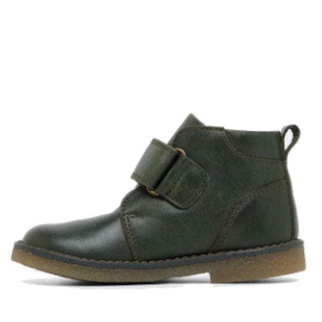 The Clarks Charlie Dark Olive Toddlers Leather Boot features dark green leather, a wide self-fastening strap, visible stitching, pull tab at the back, and a flat tan rubber sole. Shown in side profile on a white background., 9336078963895, 9336078963901, 9336078963918, 9336078963925, 9336078963932