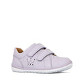 The Clarks Toddlers Macy Lilac Leather Trainer is a light purple girls’ sneaker with two velcro straps, a white sole, and a crown with dots detail on the side. This comfy kids' shoe is displayed against a plain white background.