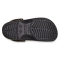 The black sole of the Crocs Classic Clog Realtree MAX7 Adults Unisex is shown from underneath, featuring a textured tread pattern and the Crocs logo with sizing marked as 5/7 on Croslite foam., 51772, 196265815142, 196265815159, 196265815166, 196265815173, 196265815180, 196265815036, 196265815043, 196265815050, 196265815067, 51782