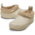 The Crocs Adults Classic Lined Shorty Clog in Sandstone Off White features a warm fuzzy liner, textured waterproof sole, and a back strap with pull tab for easy wear.