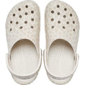 The Crocs Adults Classic Animal Clog in Almond Tint Leopard is a light beige clog with a leopard print, featuring top ventilation holes and adjustable heel straps for comfort. Viewed from above, its lightweight design stands out., 51497, 198445344978, 198445344961, 198445344985, 51501, 51502, 51503