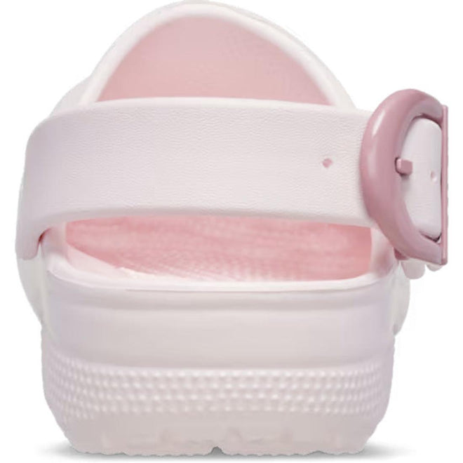 Rear view of the Crocs Adults Classic Enamel Buckle Clog in Bubble Ice Pink, featuring a textured sole, Croslite foam comfort, adjustable strap, and a pink enamel buckle on the right side., 198445416422, 198445416439, 198445416446, 198445416453, 198445416460, 51509