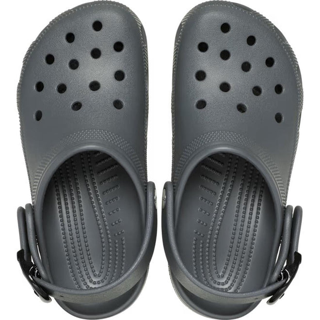 The Crocs Adults Classic Enamel Buckle Clog in Carbon Grey features ventilation holes, an adjustable backstrap, and Croslite foam construction, shown from above., 51696, 198445415715, 198445415722, 198445415739, 51700, 51701, 51696, 198445415715, 198445415722, 198445415739, 198445415746, 51701