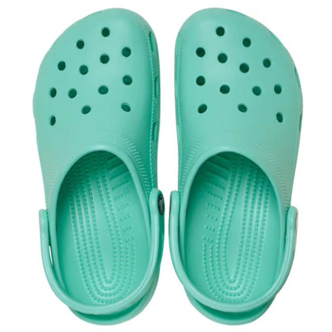 A pair of Crocs - Classic Clog Adults Retro Green unisex shoes with ventilation holes and adjustable heel straps, lightweight and comfortable, shown from above on a white background., 51783, 198445410260, 198445410277, 198445410284, 198445410291, 51788, 51789, 51790, 51791