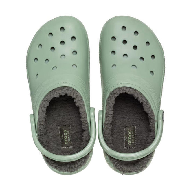 Top Down shot of a pair of moss green adults clogs with fuzzy furry lining on a white background.,
196265744640,
196265744657,
196265744664,
196265744671,
196265744688,
196265744695,
196265744589,