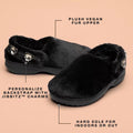 The Crocs Adults Unfurgettable Lined Clog Black Fluffy features plush faux fur, durable hard soles, and a customizable backstrap for decorative Jibbitz charms—perfect for cozy indoor or outdoor comfort. Shown on a peach background., 198445190681, 198445190698, 198445190704, 198445190711, 198445190728, 198445190735, 198445190643, 198445190650, 198445190667, 198445190674