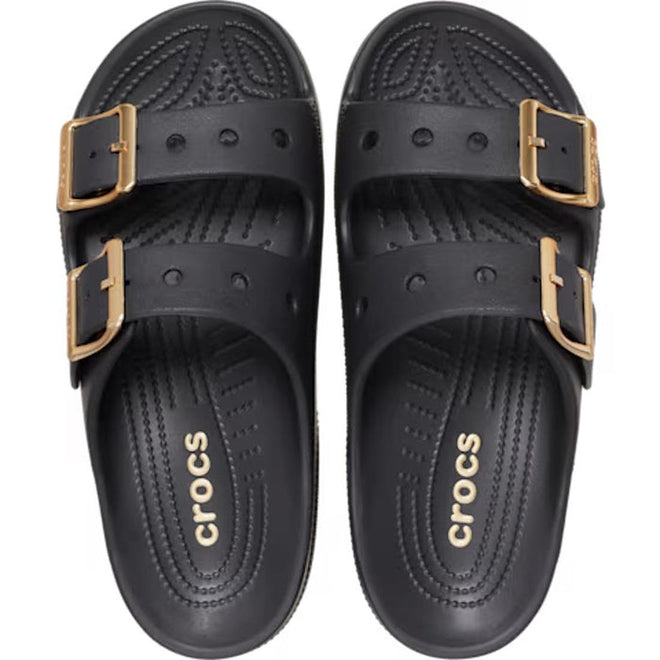 Crocs Womens Classic Metallic Buckle Saturday Sandal Slide Black features two gold adjustable straps per shoe, Crocs Comfort textured insoles, and a white “crocs” logo on the footbeds., 50021, 198445392788, 198445392795, 198445392801, 198445392818, 198445392740, 198445392757