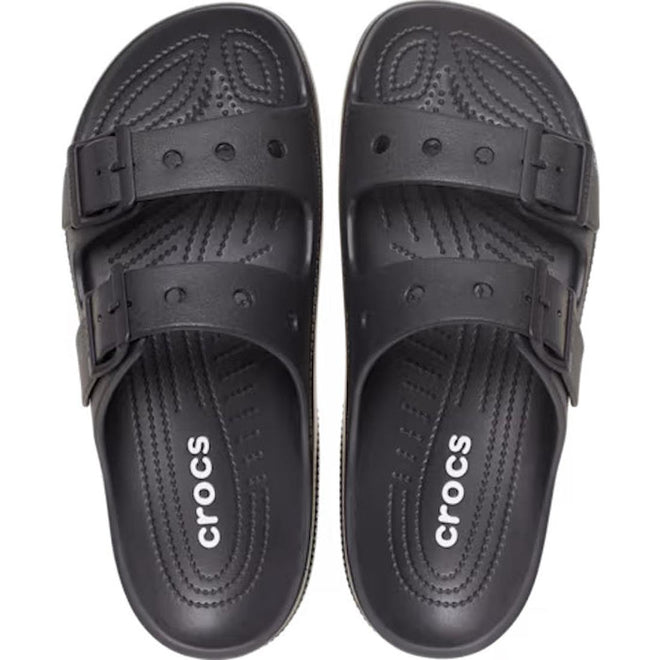 A pair of Crocs Womens Classic Saturday Sandal Slide Black, featuring two adjustable straps and textured insoles for comfort. The white Crocs logo is printed on the footbeds, seen from above., 198445397332, 198445397349, 198445397356, 198445397363, 198445397370, 198445397301, 198445397318