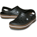 The Crocs Adults Crocband Gum Clog Black Unisex features black clogs with brown and white striped gum rubber bands, ventilation holes, adjustable heel straps, and lightweight Croslite foam cushioning.