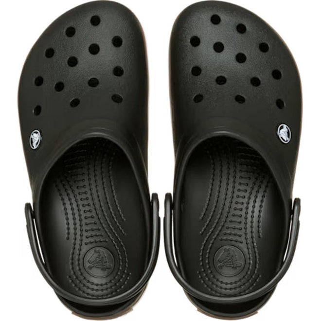 Top-down view of a pair of black Crocs Kids Crocband Gum Clog Black, featuring ventilation holes and heel straps.