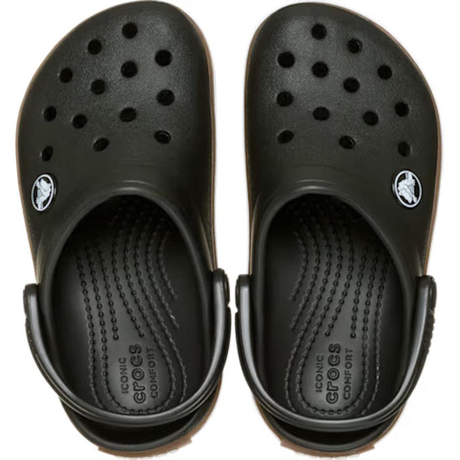 Top-down view of a pair of black Crocs Toddlers Crocbands Gum Clog Black sandals with ventilation holes, black heel straps, and tan soles.