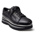 The Django & Juliette Eammes Black Leather Platform Shoe for women features black laces, a side zipper, silver eyelets, and a thick black and silver striped sole with wavy tread—perfect for women's leather platform shoe enthusiasts.