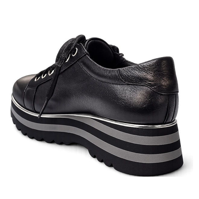 The Django & Juliette Eammes Black Leather Platform Shoe for women features black leather, black laces, and thick striped black and gray soles, shown from the back on a white background., 51089, 4434754993411, 4434756993428, 4434754993435, 4434754993442, 4434754993459, 51095