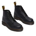 The Dr Martens 101 UB Black Ambassador 6 Eye Leather Boot features yellow stitching on the sole and a black and yellow branded pull loop at the back., 190665693683, 190665693690, 190665693706, 190665693720, 190665693737, 190665693744, 190665693768, 190665693775