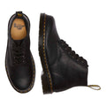 The Dr Martens 101 UB Black Ambassador 6 Eye Leather Boot, shown from top and side on a white background, features black laces, yellow stitching, Ambassador leather, and the signature branded heel loop., 190665693683, 190665693690, 190665693706, 190665693720, 190665693737, 190665693744, 190665693768, 190665693775