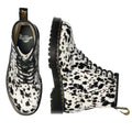 The Dr Martens 1460 Bex Dalmatian Hair On Leather Lace Up Boot is shown from the top and side against a white background, featuring a distinctive Dalmatian print crafted from hair-on leather., 190665780307, 190665780314, 190665780321, 190665780345, 190665780352, 51690
