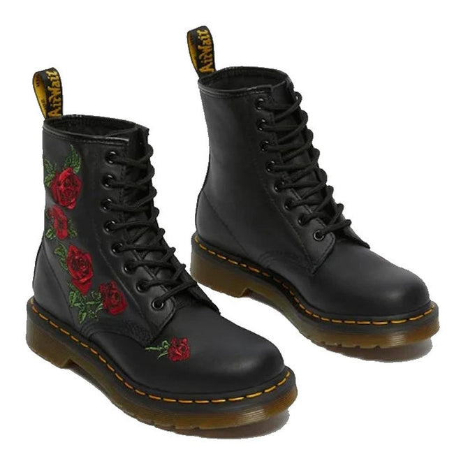 The Dr. Martens 1460 Vonda Red Roses Softy T Leather Boot features black lace-up uppers, signature yellow stitching, AirWair Bouncing Soles, and embroidered red roses with green leaves on the outer sides., 190665206036, 190665206043, 190665206050, 190665206074, 190665206081, 190665206098